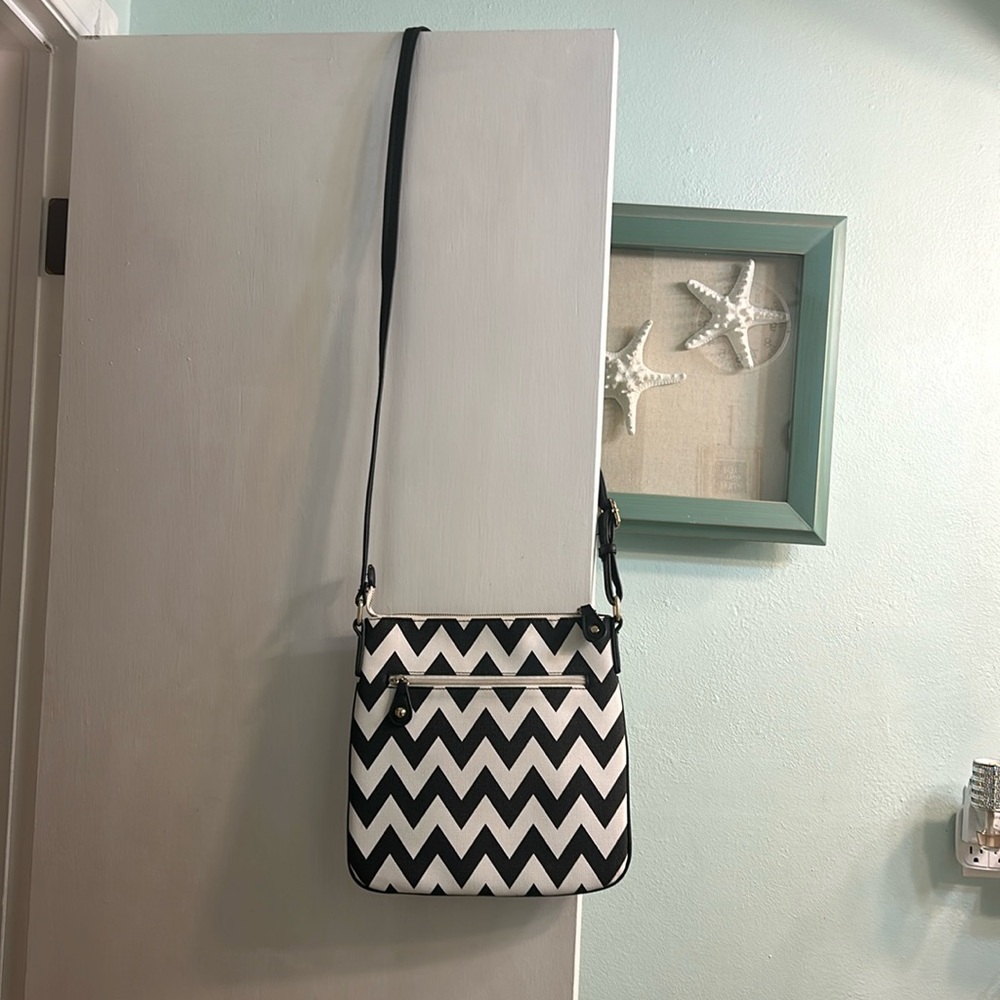 Black and white crossbody purse.
